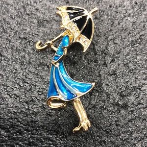 Lady in Blue enamel with Umbrella